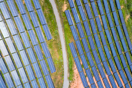 aerial view of photovoltaic panels on hillside , clean energy for solar power