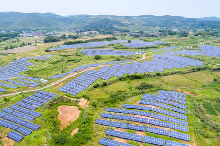 solar power station on hillside, aerial view of new energy in mountainous area