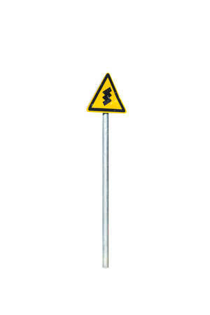 winding road traffic warning sign and steel post