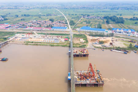 aerial view of bridge construction site on yangtze river, China