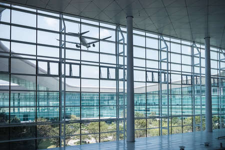 modern airport window scene with airplaneのeditorial素材