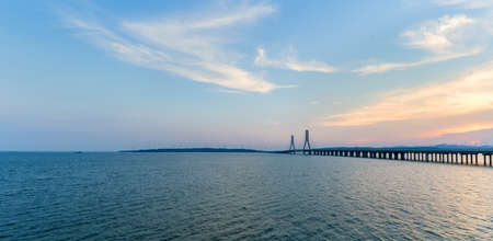 The second Poyang Lake bridge panorama at dusk, Jiangxi, Chinaの写真素材