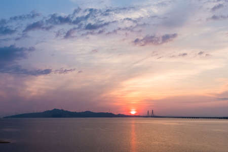 The second Poyang Lake bridge sunrise, Jiangxi province, Chinaの写真素材