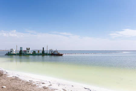 qarhan salt lake landscape with barge for salt harvest, golmud city, qinghai province, Chinaの写真素材