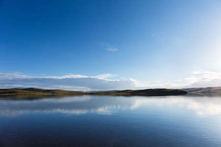 beautiful plateau lake and reflection with blue sky, madoi county, qinghai province, Chinaの写真素材
