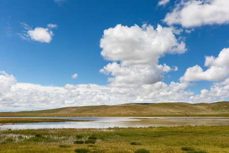 water source and plateau wetland landscape in three river sources nature reserve, qinghai province, Chinaの写真素材
