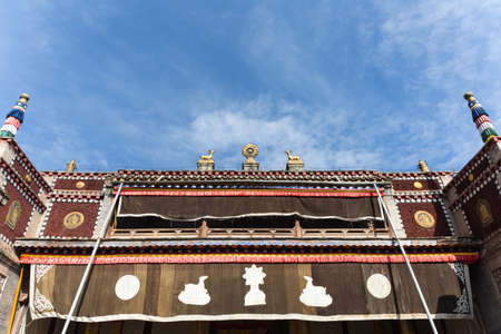 upward view of tibetan style building, kumbum monastery sutra printing house, specializing in the imprint of tibetan buddhism classics, qinghai province, Chinaのeditorial素材