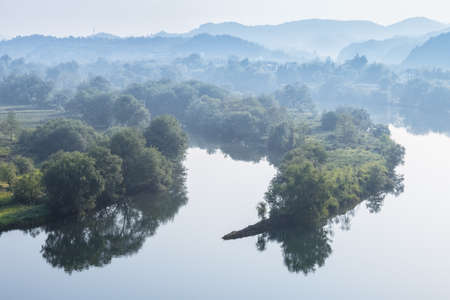 idyllic landscape of the moon bay in wuyuan county,  jiangxi province, Chinaの写真素材