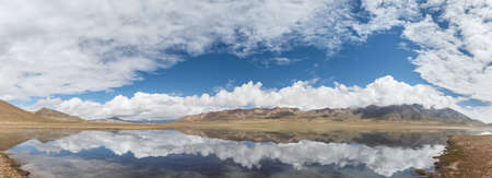 panoramic view of plateau lake and blue sky reflection, beautiful natural landscape on kunlun mountain hinterland, qinghai province, Chinaの写真素材
