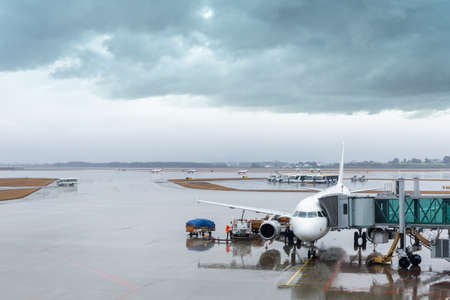 rainy view of the airport, scene outside the terminal with weatherの写真素材
