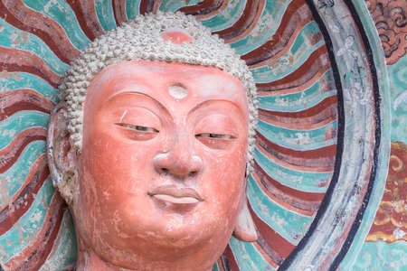 buddhist statue closeup in maiji mountain grottoes, world cultural heritage in tianshui city, gansu province, Chinaのeditorial素材