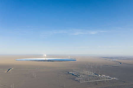 aerial view of solar thermal power station and transformer substation on desert, dunhuang city, gansu province, Chinaの写真素材