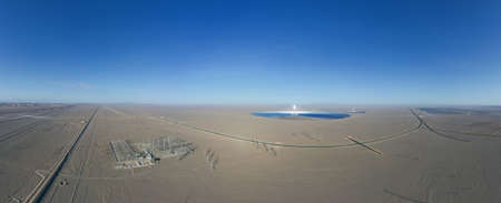 aerial view of desert solar power station, use molten salt to store heat energy and generate electricity, dunhuang city, gansu province, Chinaの写真素材