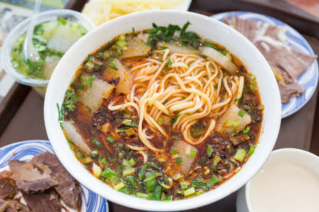 lanzhou beef noodles, lanzhou stretched noodles, a local snack in gansu province, Chinaの写真素材