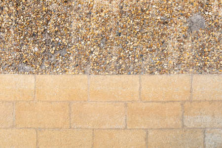 granite stone wall and cobblestone wall surfaceの写真素材