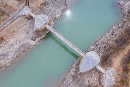 aerial view of wooden overhanging bridge, Bo-Ri bridge was built in the Qing dynasty, located in Xinlong county, Ganzi Tibetan autonomous prefecture, Chinaの写真素材