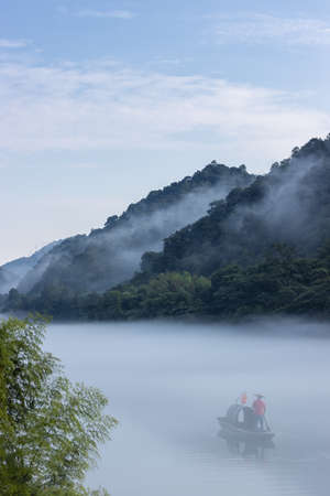 beautiful foggy river landscape in early morning, Zixing City, Hunan Province, China.の写真素材