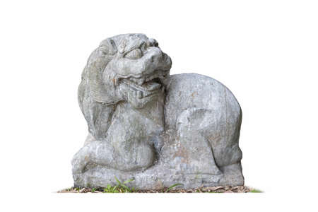 charmingly naive ancient stone lion statue isolated on whiteの写真素材