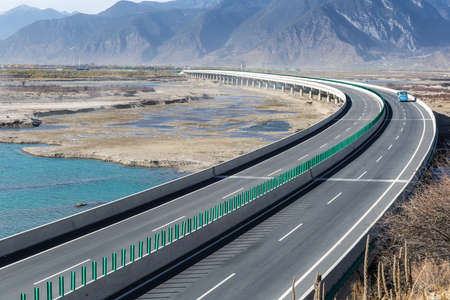 road and bridge on Nyang River, Linzhi, Tibet, Chinaの写真素材