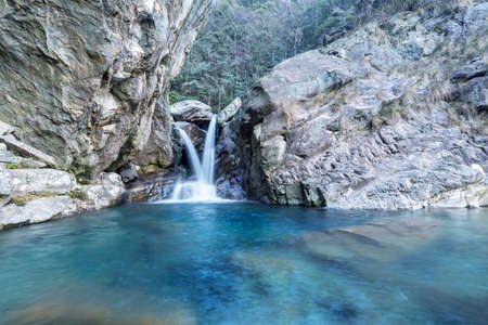 beautiful cascade landscape in Lushan mountain three-step waterfalls, Chinaの写真素材