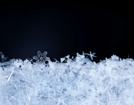 natural snowflakes on snowの写真素材