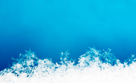 natural snowflakes on snow. the picture is made at a temperature of -10 Cの写真素材