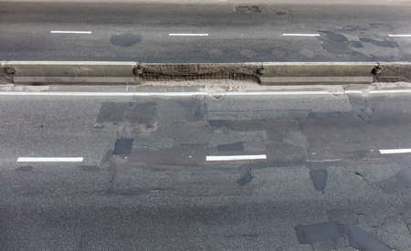 asphalt road in closeup shotの写真素材