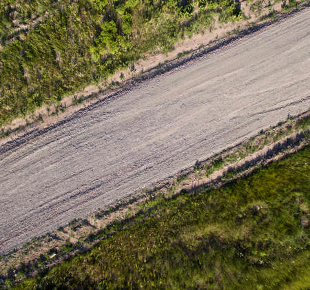 road of small gravel, aerial photographyの写真素材