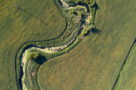 banks of a swampy river, view from aboveの写真素材