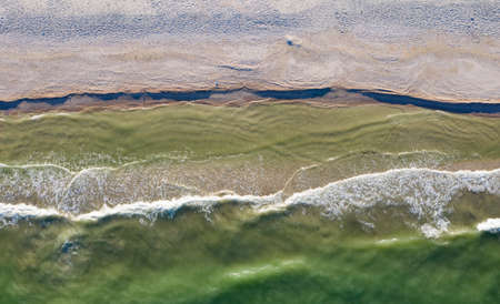 surf, waves on the seashore, top view