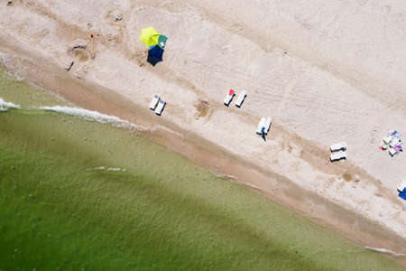 sandy beach on the seashore, view from aboveの写真素材