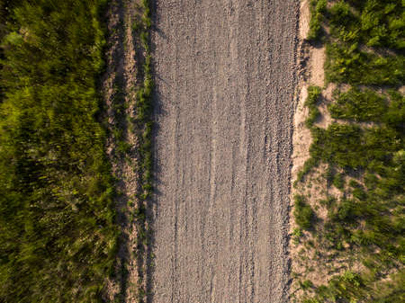 road of small gravel, view from aboveの写真素材