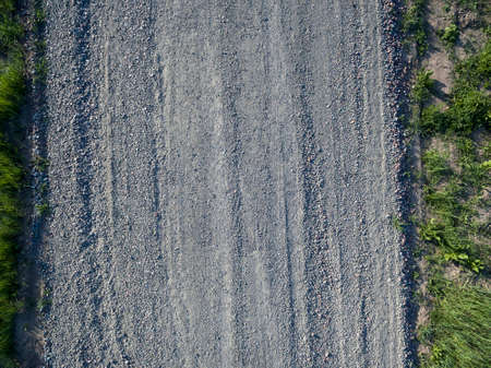 road of small gravel, view from aboveの写真素材
