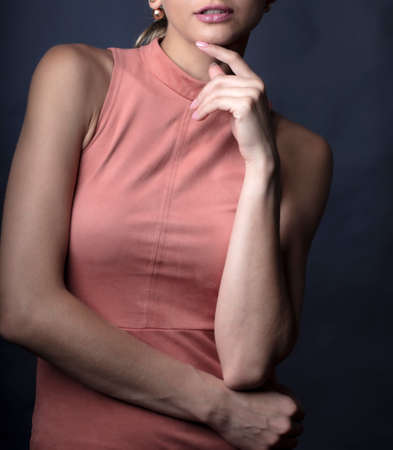 female figure in clothes, studio portraitの写真素材