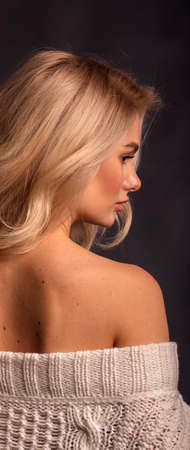 Blonde, studio portrait of a young girlの写真素材