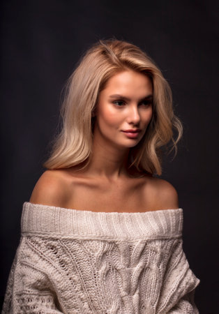 Blonde, studio portrait of a young girlの写真素材