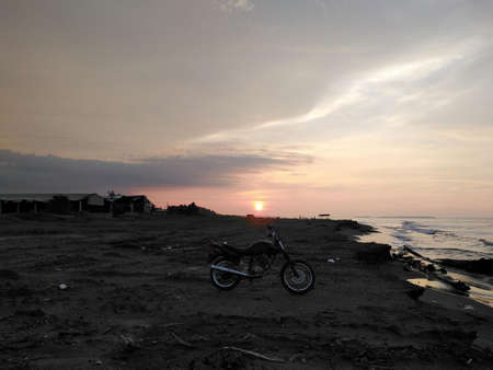 a motorcycle on the beach.の写真素材