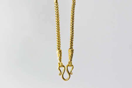 Gold on a white background.