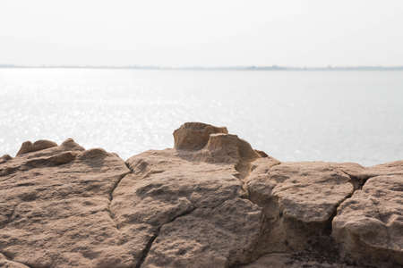 Rocks along the dam in the daytime.の写真素材