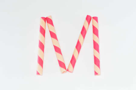 Wafer cream stuffed strawberry berries on a white background.の写真素材