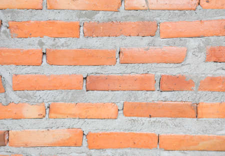 Walls made of red bricks and cement.の写真素材