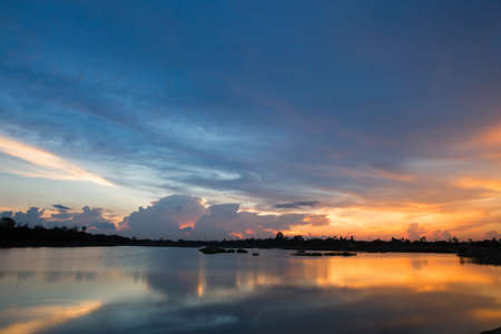 Silhouette lagoon at sunset the evening.の写真素材