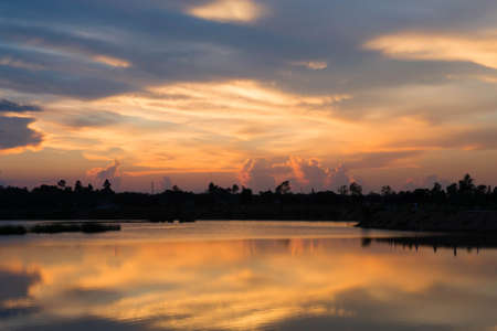 Silhouette lagoon at sunset the evening.の写真素材