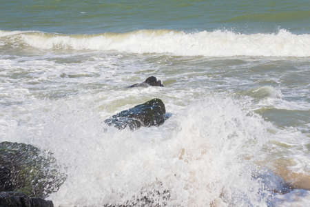 Stone on the beach clearance by the sea waves batter.