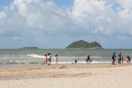 Songkhla, Thailand - DEC 7 : People are strolling the beach and swimming in the sea on december 7, 2015 in Songkhla, Thailand.のeditorial素材