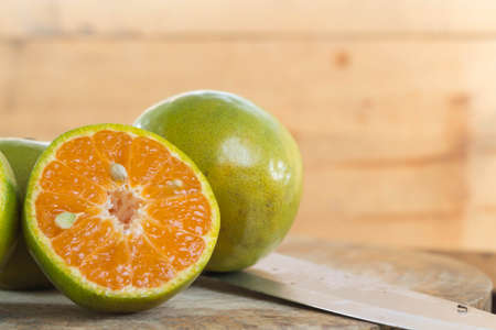 Vintage orange on a wooden floor.の写真素材