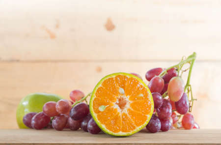Vintage fruits on a wooden floor.の写真素材