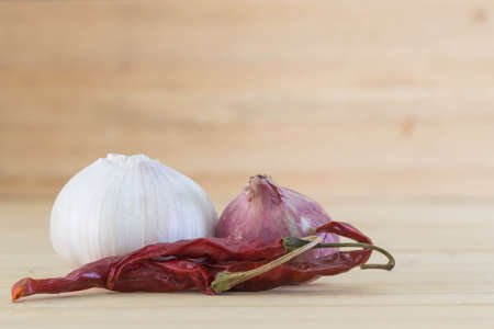 Spices placed on the wooden floor.の写真素材