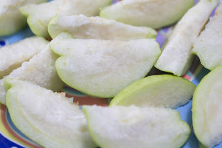 Guava was sliced on a dish.の写真素材