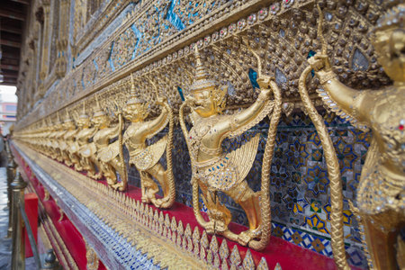 Garuda sculpture at Wat Phra Kaew in Bangkok as a tourist attraction.のeditorial素材